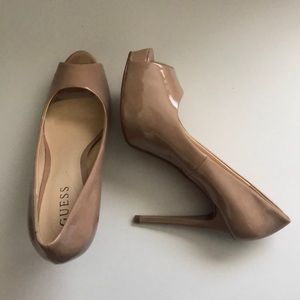 Guess nude “leather” peep toe stilettos.